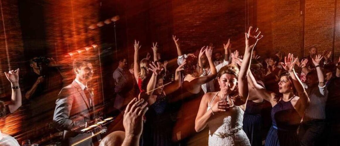 Bride Raises Hand and Parties